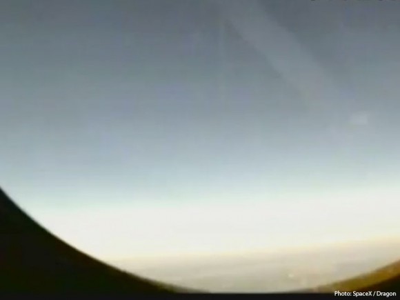 View from orbit from the side window of the Dragon spacecraft, received via video as it passed over Hawaii during its first orbit. Credit: SpaceX