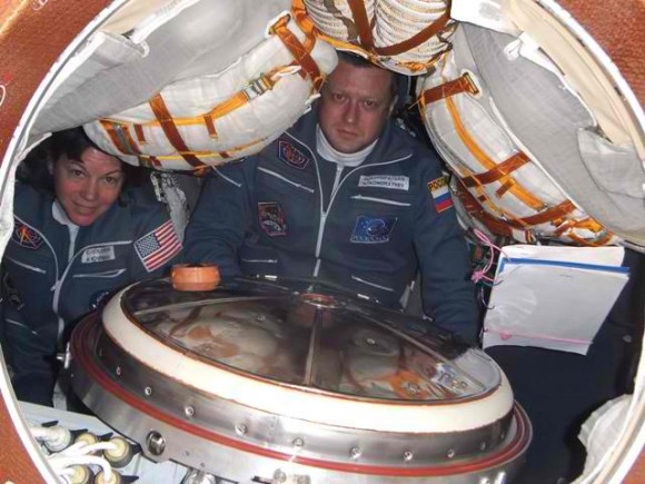 Astronaut Cady Coleman and cosmonaut Dmitry Kondratyev inside the living area of the Soyuz TMA-20. Credit: Roscosmos.