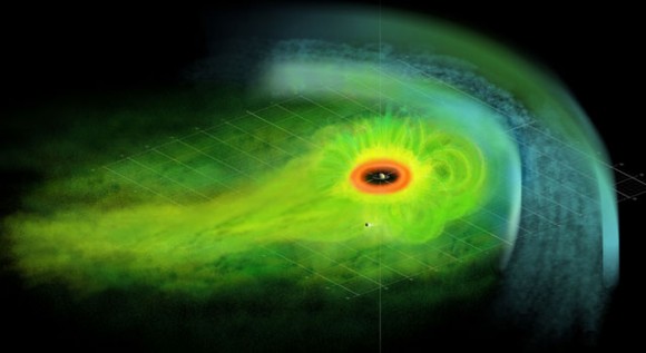 This is an artist's concept of the Saturnian plasma sheet based on data from Cassini magnetospheric imaging instrument. It shows Saturn's embedded "ring current," an invisible ring of energetic ions trapped in the planet's magnetic field. Credit: NASA/JPL