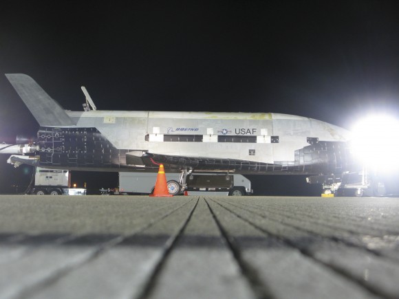 X-37B is shown here after landing at 1:16 a.m. Pacific time today, concluding its more than 220-day experimental test mission. Credit: Boeing