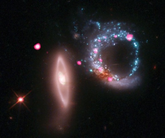 Arp 147 contains a spiral galaxy (right) that collided with an elliptical galaxy (left), triggering a wave of star formation. Credit: X-ray: NASA/CXC/MIT/S.Rappaport et al, Optical: NASA/STScI