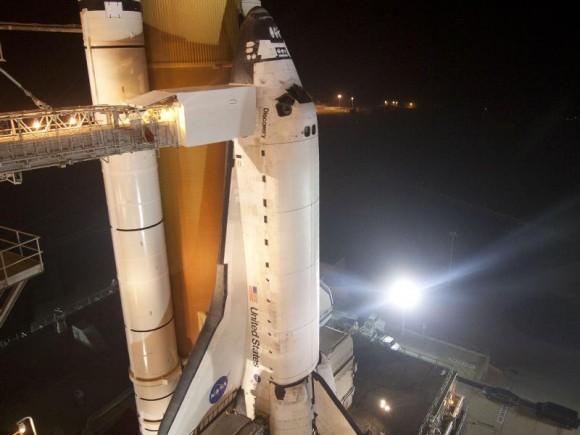 At NASA's Kennedy Space Center in Florida, space shuttle Discovery is seen shortly after the rotating service structure was rolled back at Launch Pad 39A. Image credit: NASA/Jack Pfaller Feb. 23, 2011
