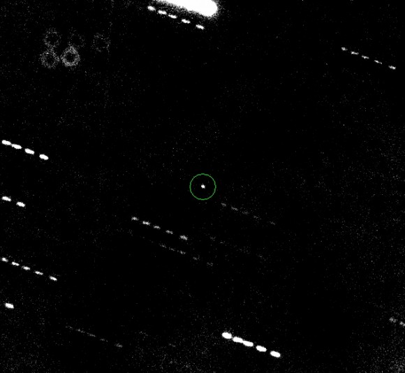 Apophis (circled) in a composite of five exposures taken on January 31 with the University of Hawaii 2.2-meter telescope on Mauna Kea. Image by D. Tholen, M. Micheli, G. Elliott, UH Institute for Astronomy.