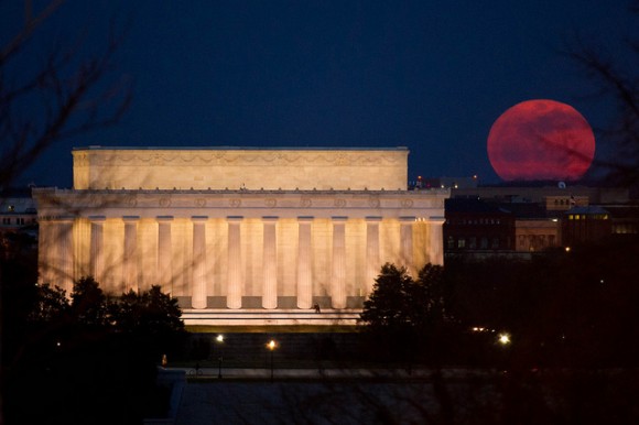The full moon is seen as it rises near the Lincoln Memorial, Saturday, March 19, 2011, in Washington. The full moon tonight is called a "Super Perigee Moon" since it is at it's closest to Earth in 2011. The last full moon so big and close to Earth occurred in March of 1993. Photo Credit: (NASA/Bill Ingalls)