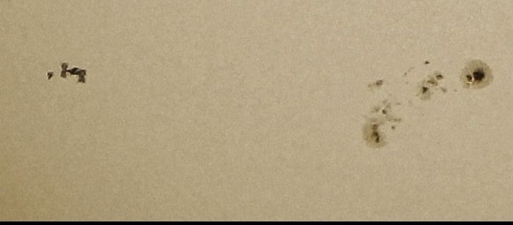 Cropped version of the ISS/Discovery/sunspont conjunction. Credit: Catalin Fus. Used by permission.
