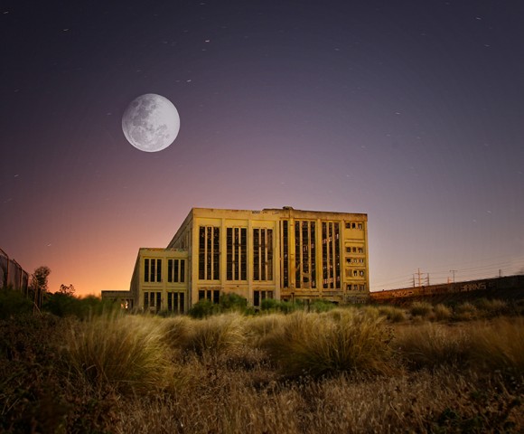 The Moon and an old coal fired power station in Fremantle, Western Australia. Credit: Donna Oliver Rockingham, Western Australia