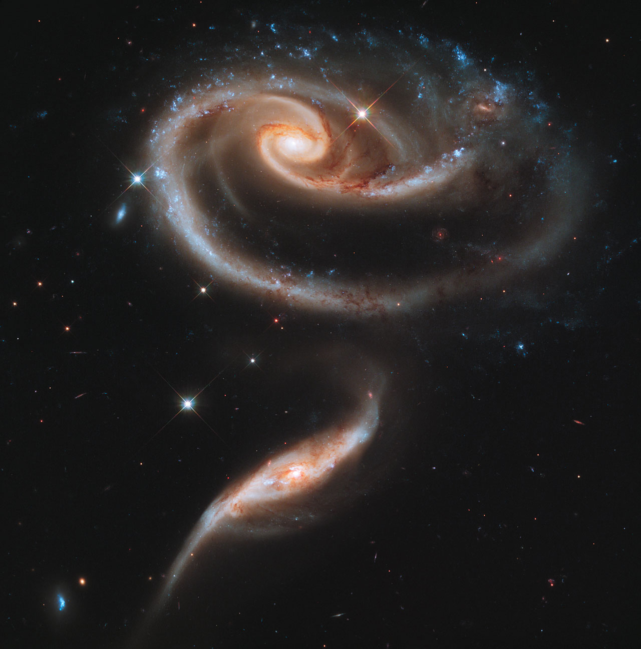 http://d1jqu7g1y74ds1.cloudfront.net/wp-content/uploads/2011/04/Hubble-galactic-rose.jpg