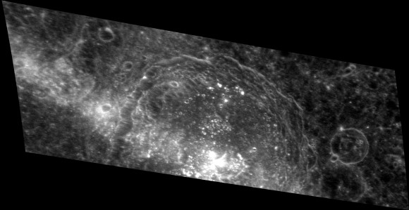 Bright central peaks show up in this oblique-view image of a large crater, Asvaghosa, on Mercury.