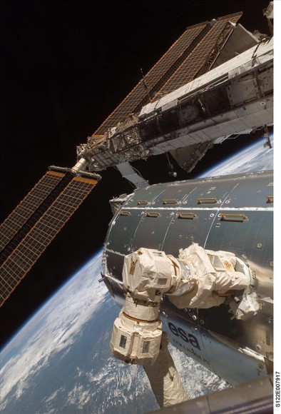 February 12, 2008 – Here, Canadarm2 has a firm grip on the European Space Agency’s Columbus module, which it grappled and attached to the station. Credit: NASA