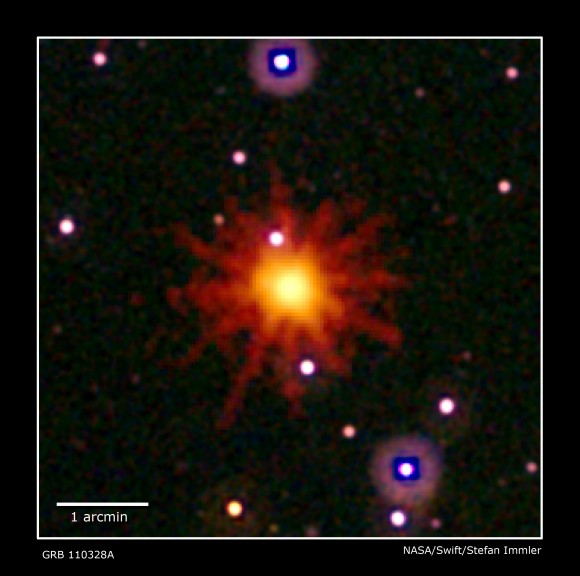Images from Swift's Ultraviolet/Optical (white, purple) and X-ray telescopes (yellow and red) were combined in this view of GRB 110328A. The blast was detected only in X-rays, which were collected over a 3.4-hour period on March 28. Credit: NASA/Swift/Stefan Immler