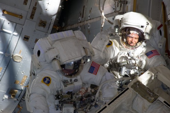 Astronauts Andrew Feustel (right) and Michael Fincke work during the STS-134 mission's third spacewalk. Credit: NASA