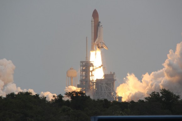 Atlantis thunders to life at Launch Pad 39 A at KSC on July 8. Credit: Ken Kremer