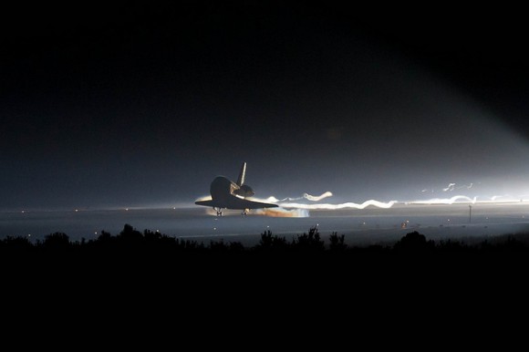 Space shuttle Atlantis touches down at Kennedy Space Center for the final time. Credit: NASA. Click for high resolution versions.