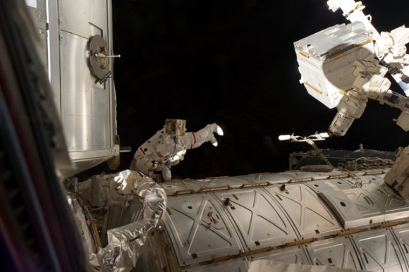 Mike Fossum works outside the ISS during the six and a half hour spacewalk, the final of the shuttle era. Credit: NASA.