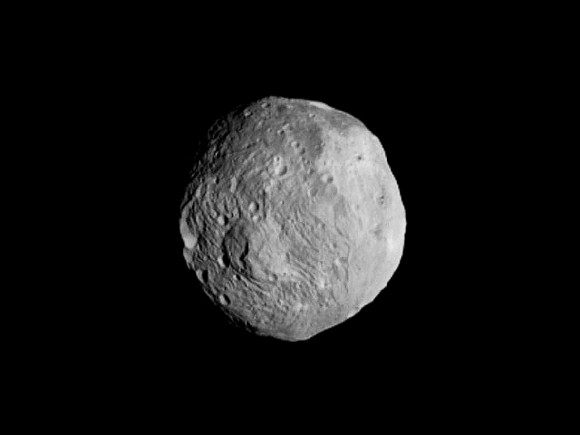 An enhanced view of Vesta from the July 9, 2011 image taken by the Dawn spacecraft. Credit: NASA/JPL-Caltech/UCLA/MPS/DLR/IDA, enhancements by Stu Atkinson.