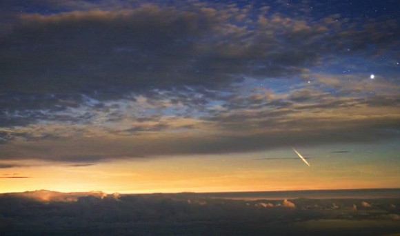 A Perseid meteor is caught on camera by the Canada-France-Hawaii Telescope's mounted low-light Cloudcam before dawn on the morning of August 12, 2011. Still frame cropped and edited by J. Major