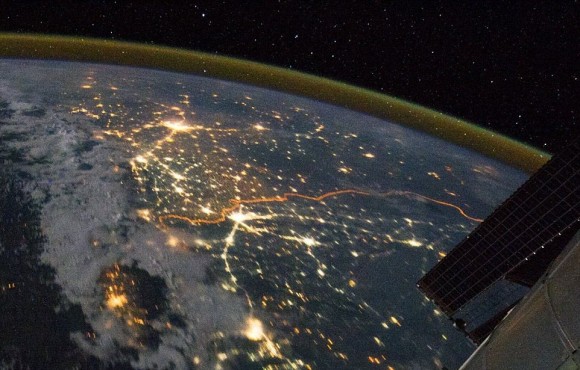 This picture shows the illuminated man-made border between India and Pakistan,the line snaking through the landscape, as seen from the International Space Station on August 21, 2011. Of the hundreds of clusters lights, the largest are the capital cities of Islamabad, Pakistan, and New Delhi, India. Credit: NASA/Ron Garan