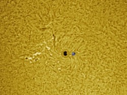 The Earth compared to Sunspot 1312 on 10-10-11. Credit: Ron Cottrell. The Earth compared to Sunspot 1312 on 10-10-11. Credit: Ron Cottrell.
