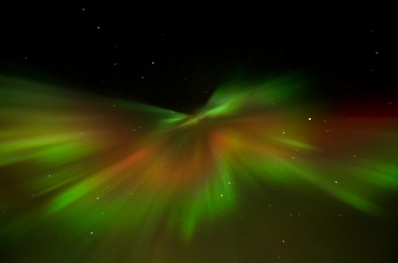 This photo was taken on January 22, 2012 in Fairbanks North Star Borough County, Alaska, US, using a Nikon D5000. The explodey look is due to perspective from looking right up the magnetic field lines. The aurora in the middle of the explosion is pointing straight down at the camera. Credit: Jason Ahrns