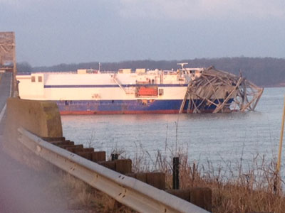 The Delta Mariner covered with debris from the bridge it collided with. Credit:Maritimematters.com