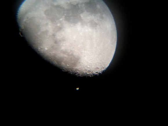 In some areas of South America, the conjunction actually became an occultation. This picture captures the moment when about half of Jupiter was behind the (dark part of) the disk of the Moon. Credit and copyright: Sergio Gorbach, Buenos Aires, Argentina.