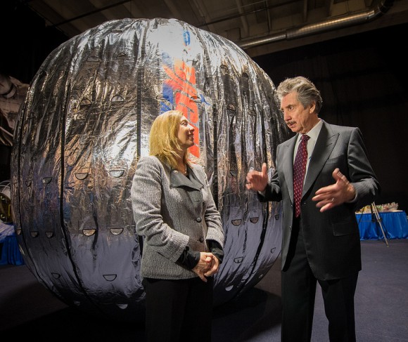 NASA Deputy Administrator Lori Garver and President and founder of Bigelow Aerospace Robert Bigelow talk while standing next to the Bigelow Expandable Activity Module (BEAM) during a media briefing on , Jan. 16, 2013. BEAM is scheduled to arrive at the space station in 2015 for a two-year technology demonstration. Photo Credit: (NASA/Bill Ingalls)