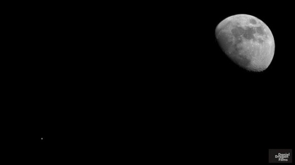 Planet Jupiter vs. the Moon. The small orb on the lower left is the planet Jupiter visible near the moon in the night sky of January 21, 2013. Credit and copyright: Daniel Lowe/danieldragonfilms.com./IStockTimelapse.com