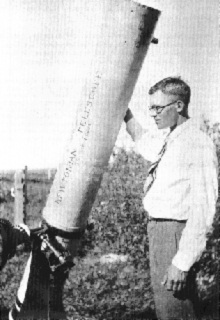 A young Clyde Tombaugh with one of his famous homemade telescopes. (Credit : NASA/GSFC).