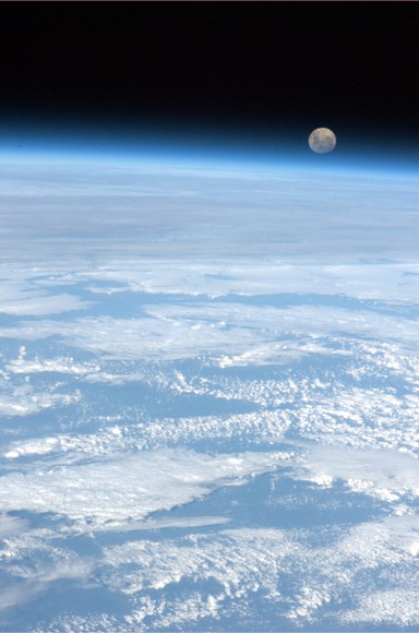 'The full moon rises over the only planet we have ever called home,' Tweeted astronaut Chris Hadfield.