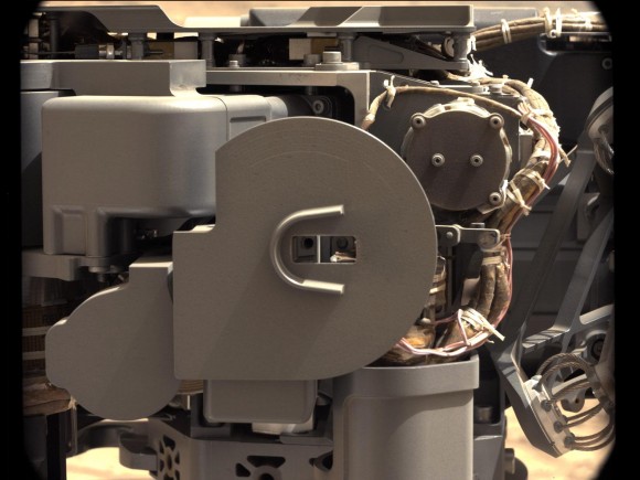 NASA's Mars rover Curiosity took this image of Curiosity's sample-processing and delivery tool just after the tool delivered a portion of powdered rock into the rover's Sample Analysis at Mars (SAM) instrument. This Collection and Handling for In-situ Martian Rock Analysis (CHIMRA) tool delivered portions of the first sample ever acquired from the interior of a rock on Mars into both SAM and the rover's Chemistry and Mineralogy (CheMin) instrument. Credit: NASA/JPL-Caltech/MSSS