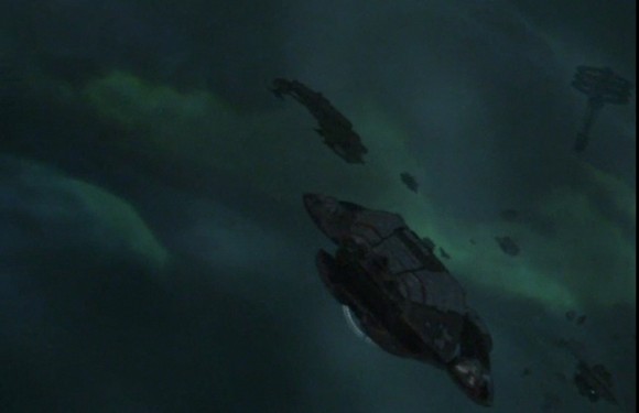 Those bright colors surrounding Battlestar's ships are not actually what you would see if nestled in a nebula, according to Harvard astronomer. Credit: Battlestar Galactica/SciFi (screencap)