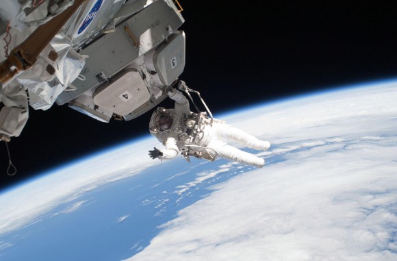 STS-130's Nicolas Patrick casually hanging out beneath the cupola after helping install it. Credit: NASA