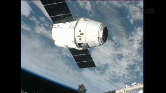SpaceX Dragon holding at 10m capture point. ISS crew standing by for "go" to perform grapple. Credit: NASA