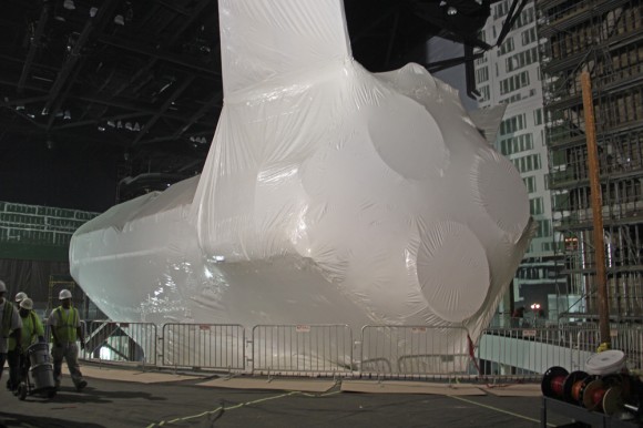 Rear-side view of plastic wrapped Space Shuttle Atlantis inside museum home under construction at the Kennedy Space Center Visitor complex in Florida. Credit: Ken Kremer (kenkremer.com)