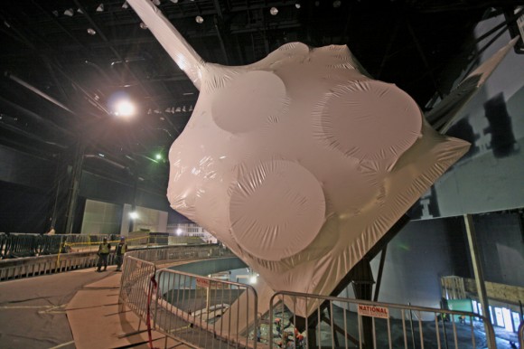 Rear view of plastic wrapped Space Shuttle Atlantis and 3 main engines at the Kennedy Space Center Visitor Complex in Florida. Credit: Ken Kremer (kenkremer.com)