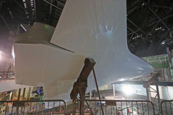 Plastic wrapped Space Shuttle Atlantis tilted at 43.21 degrees and mounted on pedestals at the Kennedy Space Center Visitor Complex in Florida. Credit: Ken Kremer (kenkremer.com)