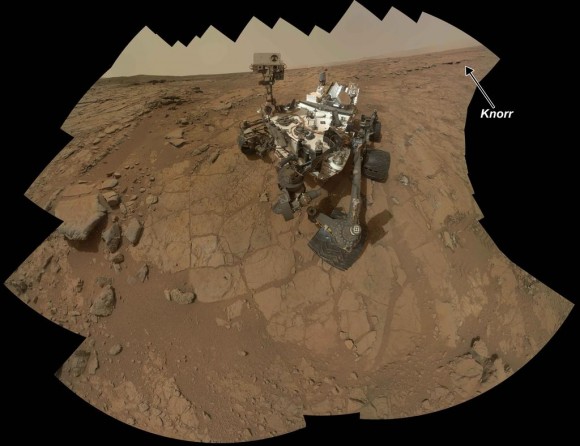 Rock Target ‘Knorr’ Near Curiosity. Scientists used Curiosity's Mast Camera (Mastcam) to study spectral characteristics of the rock target called Knorr in the Yellowknife Bay area and determined that it possessed veins of hydrated minerals, including hydrated calcium sulfate. This self-portrait is a mosaic of images taken by Curiosity's Mars Hand Lens Imager (MAHLI) camera during Sol 177 (Feb. 3, 2013). Credit: NASA/JPL-Caltech/MSSS