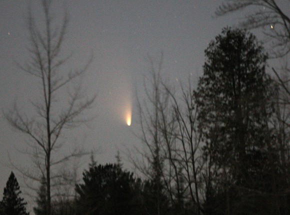Comet PANSTARRS very low in the northwestern sky shortly before setting last night March 19. Details: 300mm lens, f2.8, ISO 3200 and about 4 seconds. Credit: Bob King