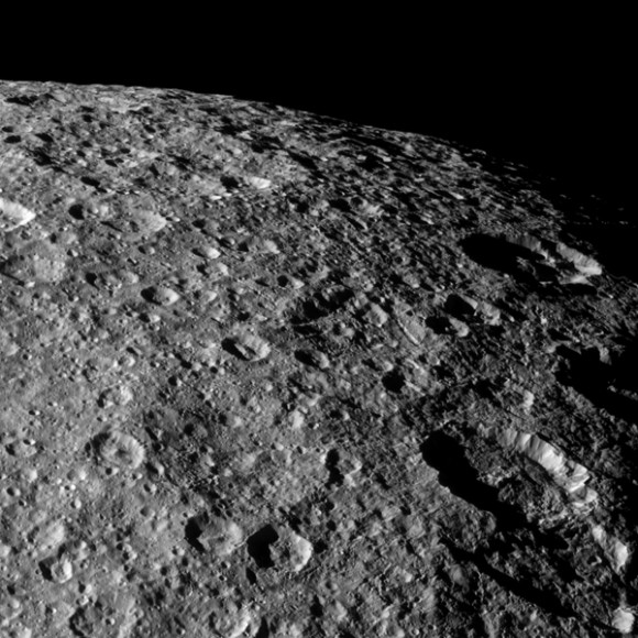 Cassini looks over the heavily cratered surface of Rhea during the spacecraft's flyby of the moon on March 10, 2012. Credit: NASA/JPL-Caltech/SSI.
