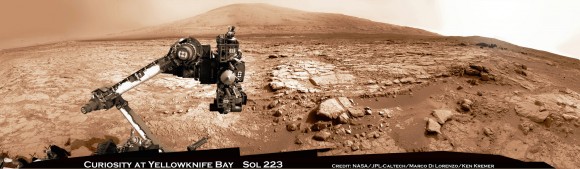 Curiosity and Mount Sharp - Parting Shot ahead of Mars Solar Conjunction. Enjoy this parting view of Curiosity's elevated robotic arm and drill are staring at you; back dropped with her ultimate destination - Mount Sharp - in this panoramic vista of Yellowknife Bay basin snapped on March 23, Sol 223, by the rover's navigation camera system. The raw images were stitched by Marco Di Lorenzo and Ken Kremer and colorized. Credit: NASA/JPL-Caltech/Marco Di Lorenzo/KenKremer (kenkremer.com). See video below explaining Mars Solar Conjunction