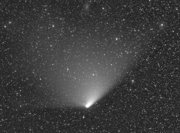 Comet C/2011 L4 PANSTARRS on the evening of April 9, 2013 from Austria. Dust released when the sun vaporizes the comet's ice is pushed back by the pressure of sunlight to form the tail. Click to enlarge. Credit: Michael Jaeger