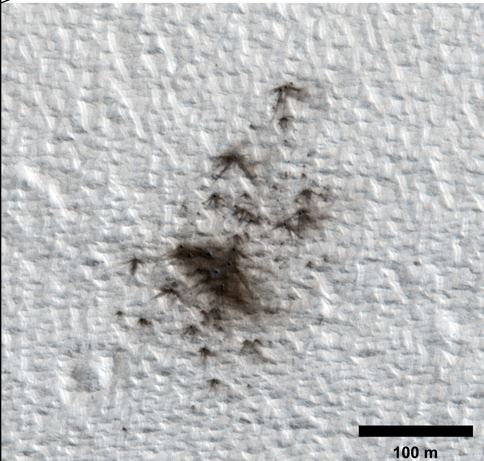 A relatively new cluster of impact craters on Mars as seen by the HiRISE camera on the Mars Reconnaissance Orbiter. Credit: NASA/JPL-Caltech/MSSS/Univ. of Arizona