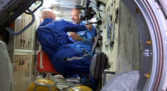 Italian astronaut Luca Parmitano, right, reacts to NASA astronaut Chris Cassidy's shaved head, a welcome present for the bald Parmitano. Via NASA TV.