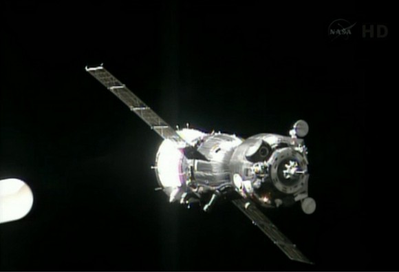 Screenshot from NASA TV of the Soyuz TMA-09M spacecraft arriving at the International Space Station.