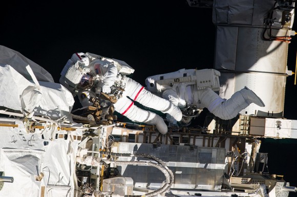 Expedition 35 Flight Engineers Chris Cassidy (left) and Tom Marshburn completed a the 5-hour, 30-minute spacewalk on May 11 to inspect and replace a pump controller box on the International Space Station’s far port truss (P6) leaking ammonia coolant. Credit: NASA