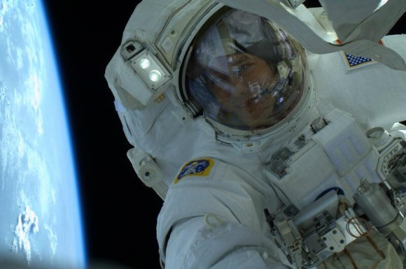 Astronaut Tom Marshburn looks toward Earth during a spacewalk on May 11, 2013 to fix a leaking coolant system. Credit: NASA.