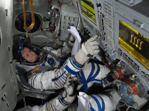 British astronaut Timothy Peake training in a Soyuz simulator. (European Space Agency)