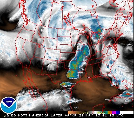This screenshot shows a false color view of the water vapor content in the clouds during the tornado outbreak in Oklahoma on May 20, 2013, as seen from NOAA geostationary (GOES) satellites. Click on image to go to current NOAA imagery.
