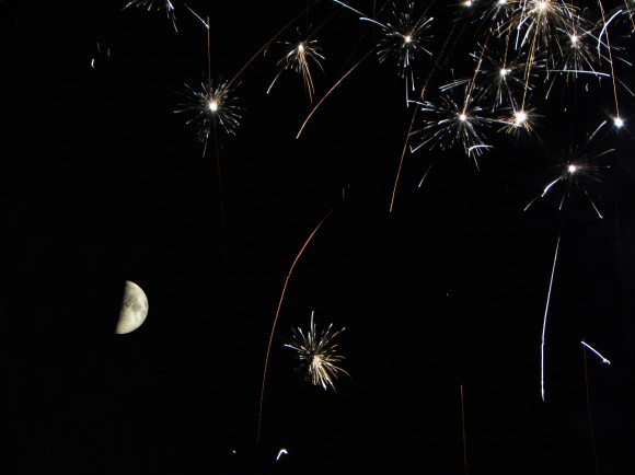 Fireworks and the quarter Moon seen over the skies of Pisa, Italy on June 16, 2013. Credit and copyright: Giuseppe Petricca.
