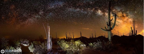 A 12-photo panoramic of the Milky Way arching over Saguaro National Park in Tucson, Arizona. Credit and copyright: Sean Parker/Sean Parker Photography.